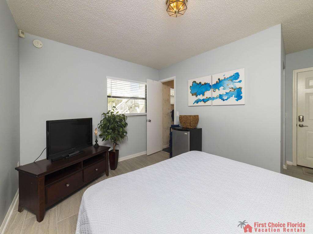 Beach Retreat Downstairs Bedroom with TV