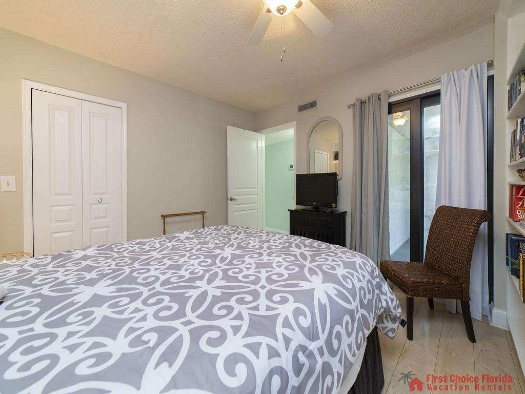 Anastasia Condo 303 Bed with TV and Chair