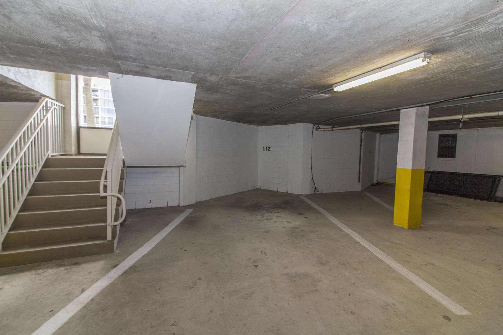 (1) Garage Parking Space + Guest Parking in Main Lot