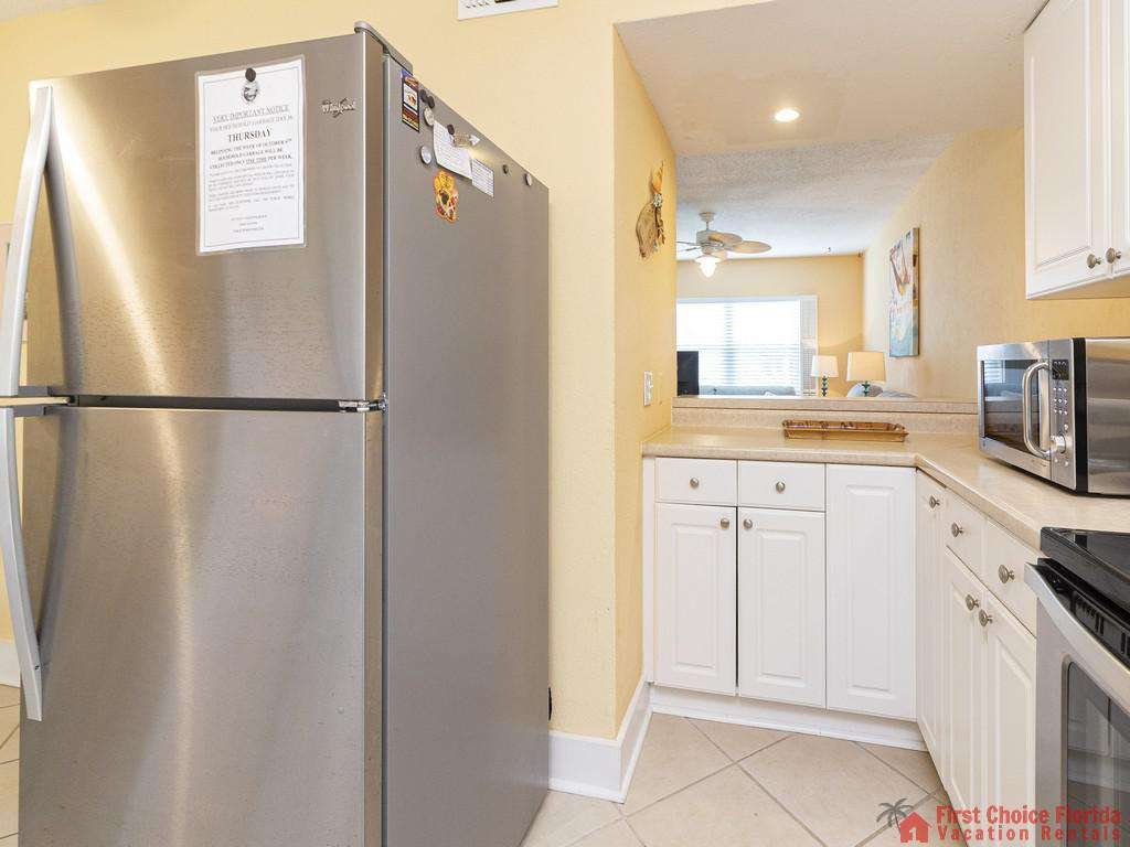 Coastal Cottage A Kitchen with Refrigerator