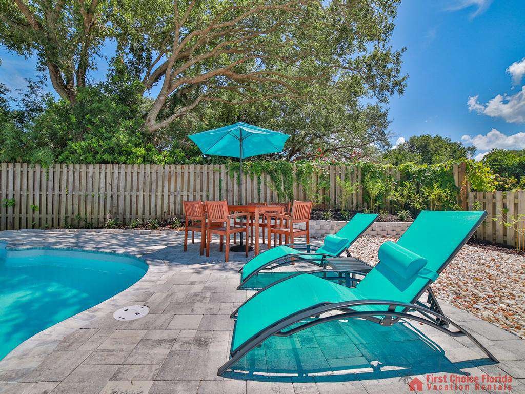 Shore Happy Lounge Chairs and Table at Poolside