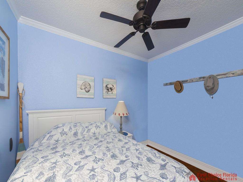 Island Surf Cottage Guest Bedroom with Fan