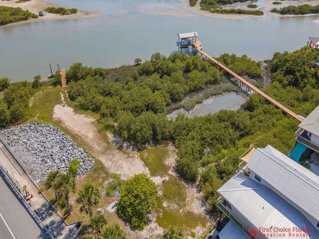 Dolphin Cove Yard Against Intracoastal